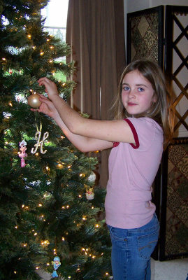 Hailey decorating the tree