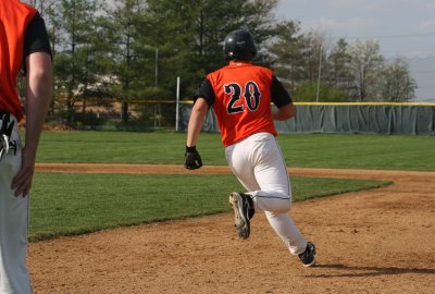  jake rounds first after base hit