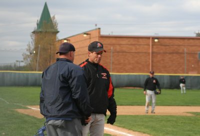 coach wardwell having a word with the umpire