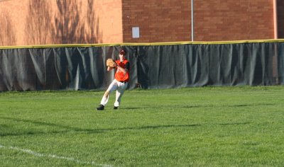 adam makes a catch in left field