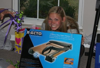 alex LOVES her new paper cutter