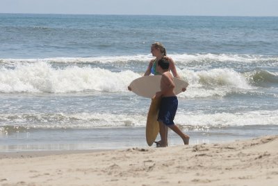 alex and patrick with their skim boards