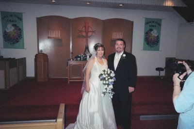 Joe and Francisca in front of altar.jpg