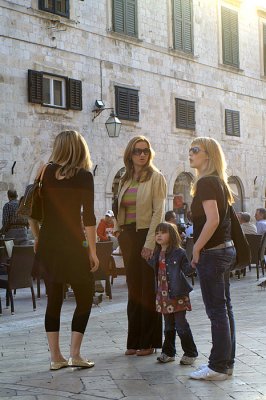 four lovely ladies in the middle of the street