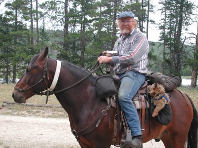 Rider with dog - day visitor to Big Sandy Lodge