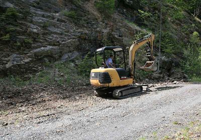 Tony grading the road to the Goat Creek trailhead