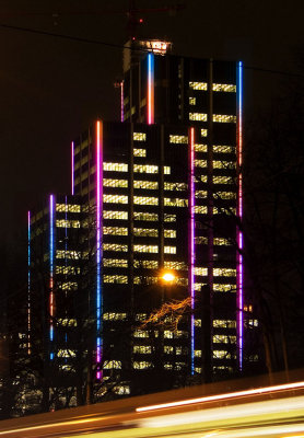 Colorful highrise building at night