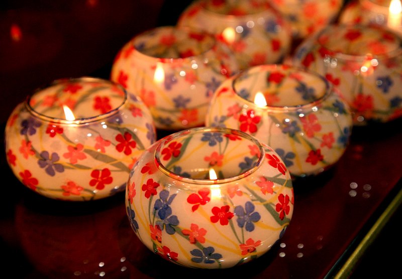 Lamp offerings for the Buddha inside a temple