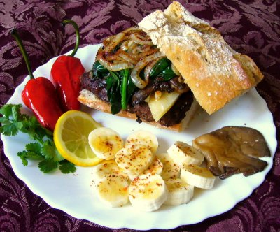 Sayten burger, sauteed onions, aged manchego, spinach, garlic, oyster mushrooms w/ sweet'n'spicy bananas