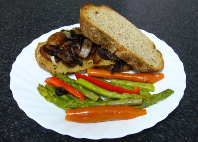 seitan burger: chili/cacao/brandy sauteed mushrooms & onions, chardonnay sauteed asparagus with peppers