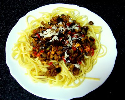linguine with sauteed eggplant, garlic, red peppers, mussels, Torres 10 yr brandy, crumbled cayenne pepper & aged sheep cheese