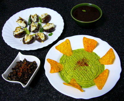 stuffed dates, cacao & aji fried pumpkin seeds, handmade avocado  with garlic and roasted habanero sauce, aztec chocolate