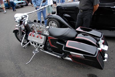Motorcycle w/ flathead V8 and 3 deuces!