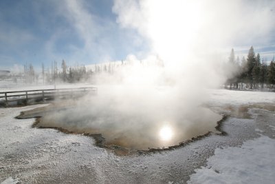 Sun reflecting off a hot spring