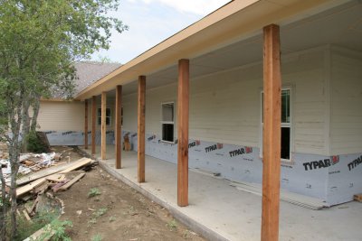 Cedar posts on the back porch - also the fascia has been painted