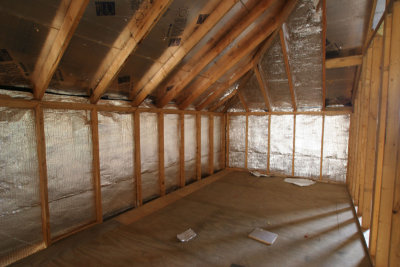 A radiant barrier (R6) is put up on the ceiling and walls