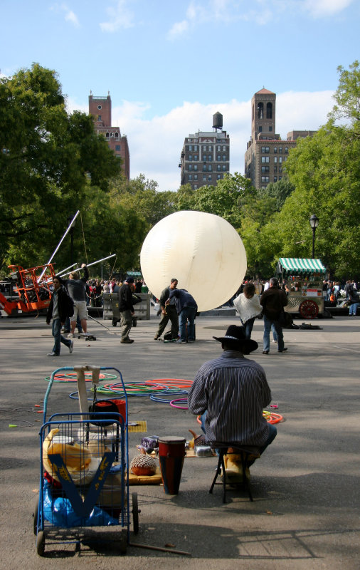 Musician with Hula Hoops & Will Smith Film Crew