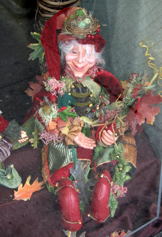 Elf in Avignon Pharmacy Window at Father Demo Square