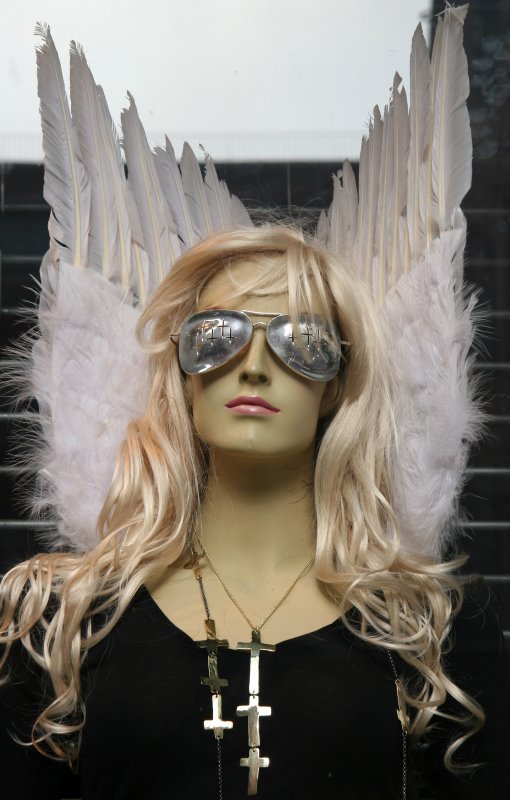 Angel Mannequin in a Store Window