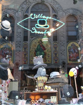 Village Scandal Shop Window with Church Reflection