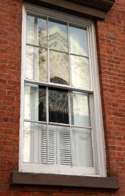 Residence Window with Church Reflection