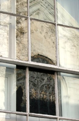 Residence Window with Church Reflection