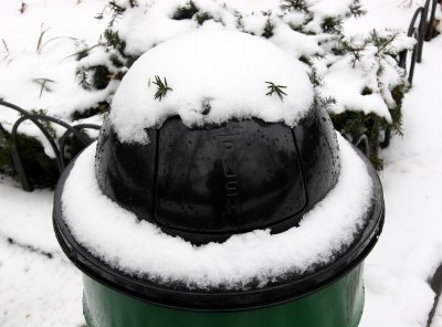 Snow Face on Trash Can
