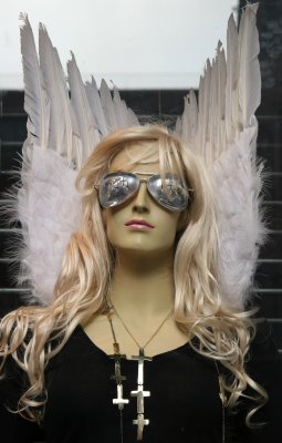 Angel Mannequin in a Store Window