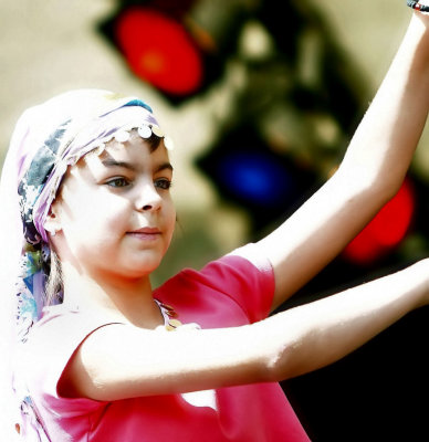 young girl performs oriental dance