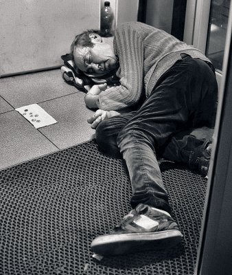 Sleeping in the foyer of a bank agency