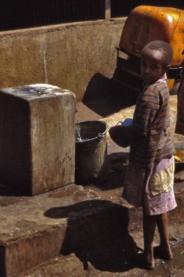 Boy gathering water in Somalia