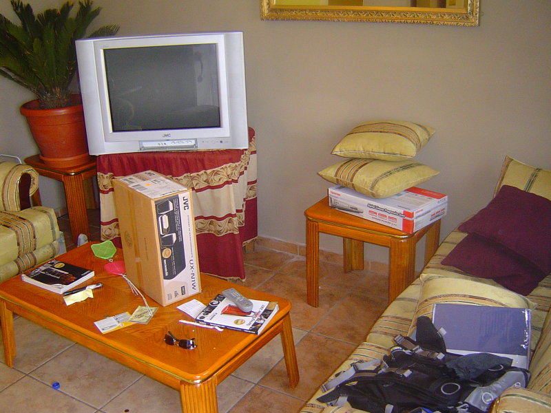 living room (the whole house is messy because this is the day the previous tennant moved out we will post cleaned up pics later)