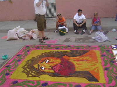 the finished alfombra (notice the sleepy kid on the left, they work from 10pm - 3am and then 6 or 7 am til they are done)