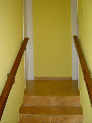 top of the stairs, office/guest bedroom on left, our bedroom on right