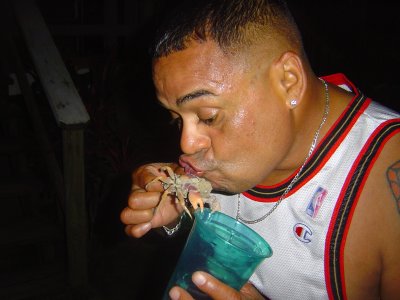 Crazy Eddy Kissing a crab.