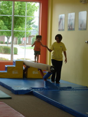 On the balance beam at the Little Gym