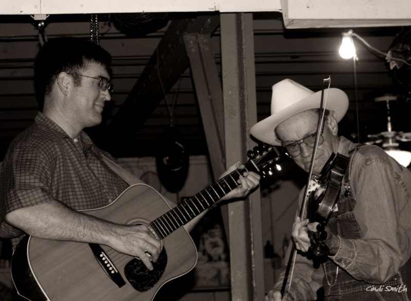 A PICKIN AND A GRINNIN