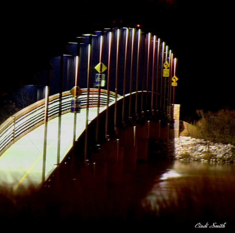 BRIDGE GOING OVER THE LITTLE STREAM