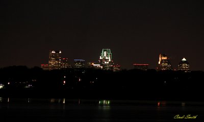 VIEW OF DOWNTOWN DALLAS FROM WHITE ROCK LAKE AT NIGHT
