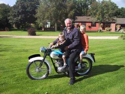 Having Fun On Grandpa's Motorbike