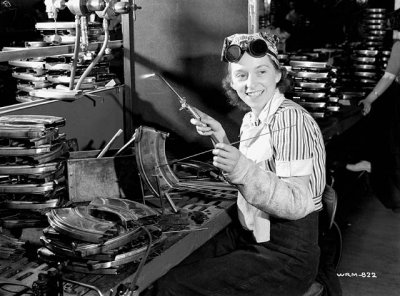 Evelyn Turner 18  welder. She is shown welding a Bren gun magazine at the John Inglis Co. Bren gun plant may 1941