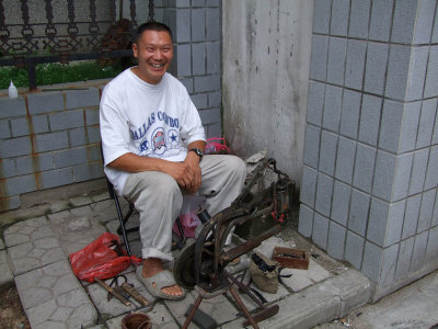 The cobbler on the street, Wuhan.