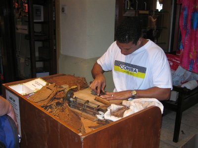 guy making homemade cigars