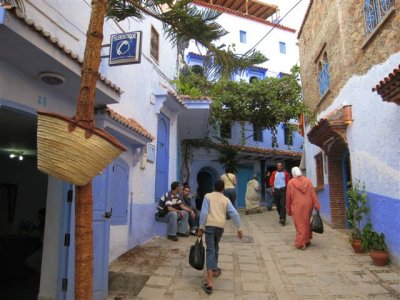 narrow streets with blue walls