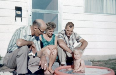 Grandpa Gross, Mom and Dad watching me piss in the pool!!