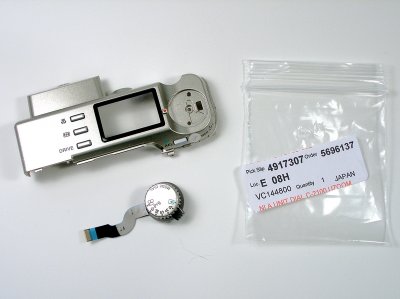 Received the new Mode Dial from Olympus Parts.
Ready to mount it to the Top Cover.