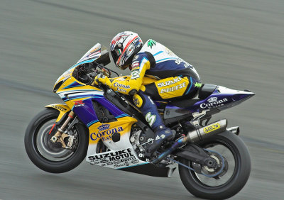 Max Biaggi -wheelying accelerating out of Abbey