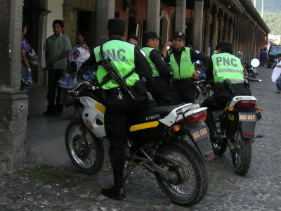 Guatemalan police bikes with Uzis. I want one, I bet one way or another heh heh heh it cuts tailgaiting waaaaay down.