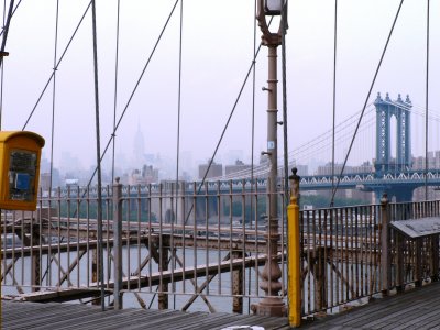 foggy view of Manhattan Bridge and skyline