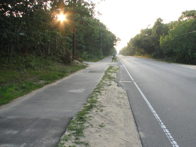 Sunburst Over Empty Bike Path  Road.jpg